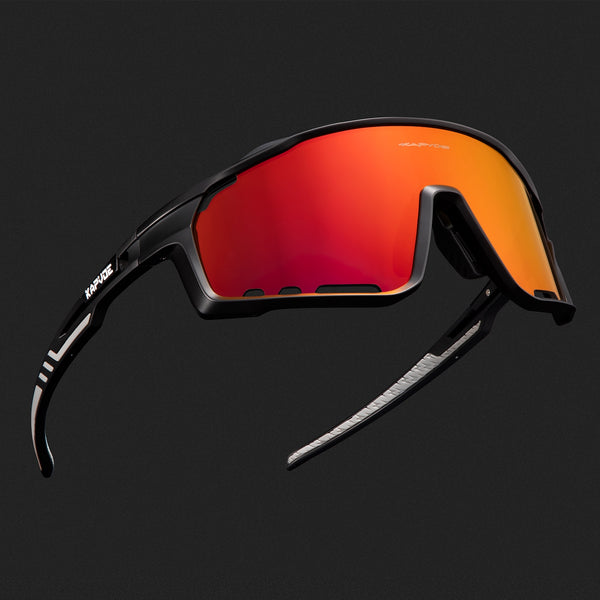 Black frame sunglasses with orange lens